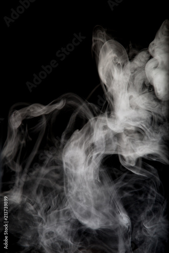 White smoke isolated on black background.
