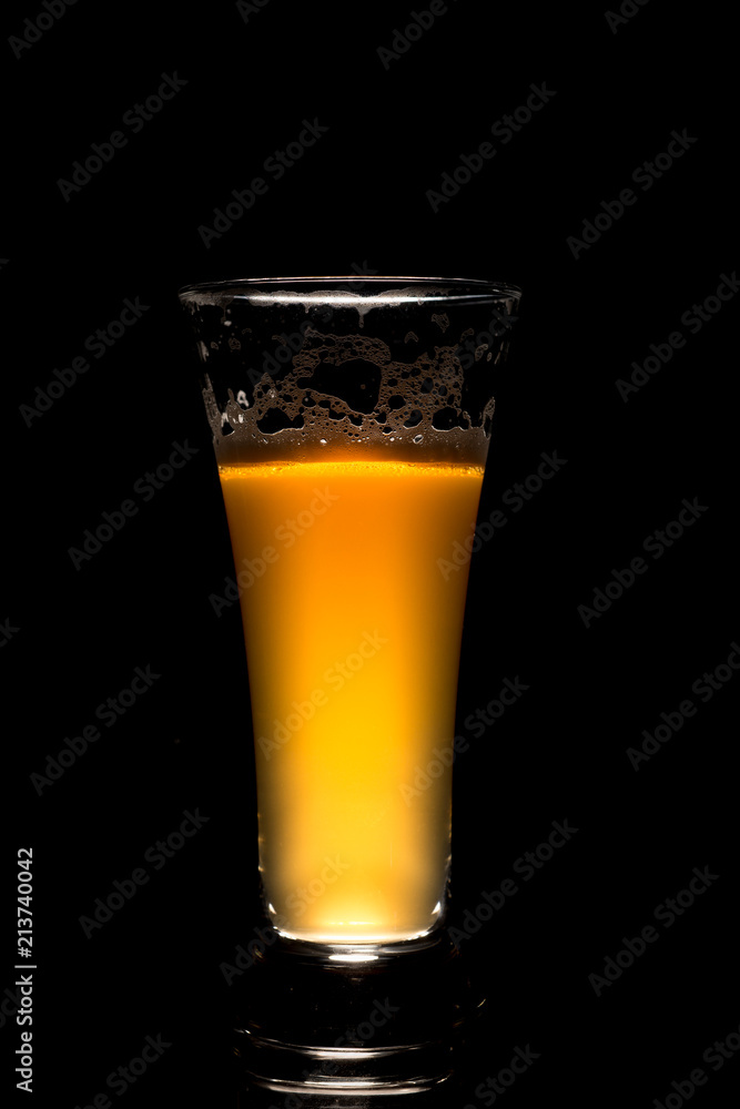 IPA craft beer glass on black background IPA craft beer glass on black background