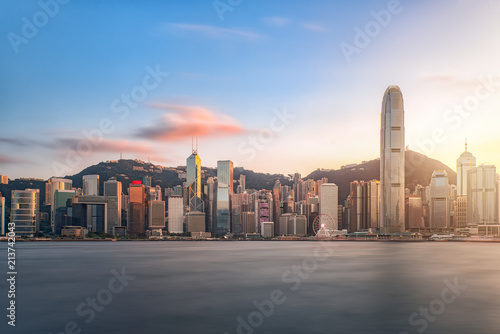 Wall Mural Hong kong city long exposure skyline business district at the sunset