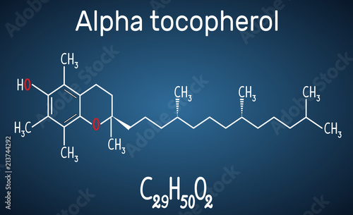 Alpha tocopherol ( vitamin E) molecule. Structural chemical formula and molecule model photo