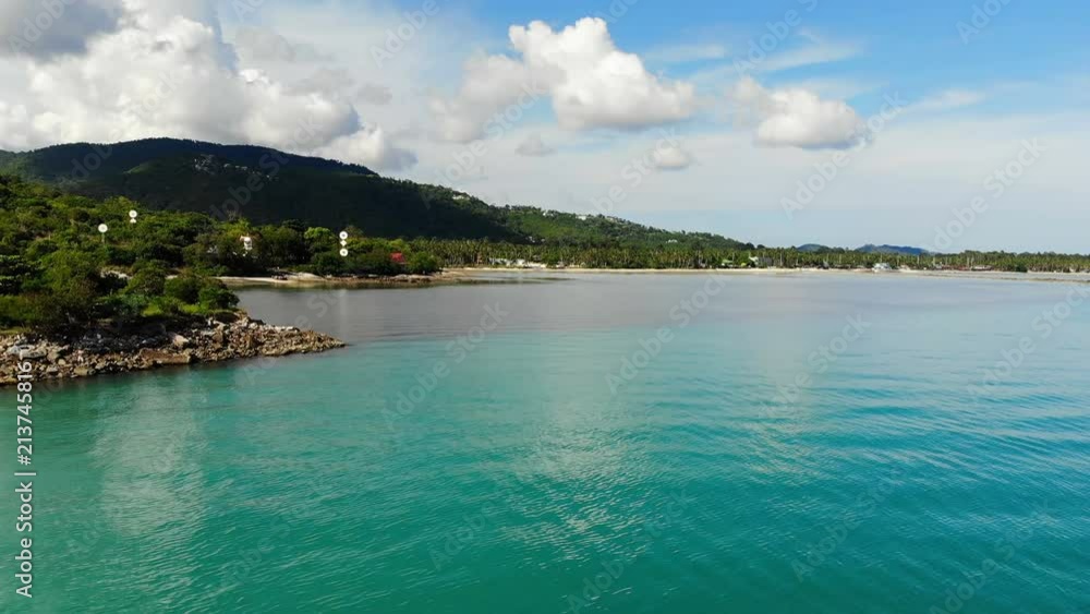 Aerial view of tropical sea and beach on white cloud and blue sky Aerial view of tropical sea and beach on white cloud and blue sky