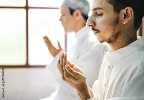 Muslim men making Dua to Allah