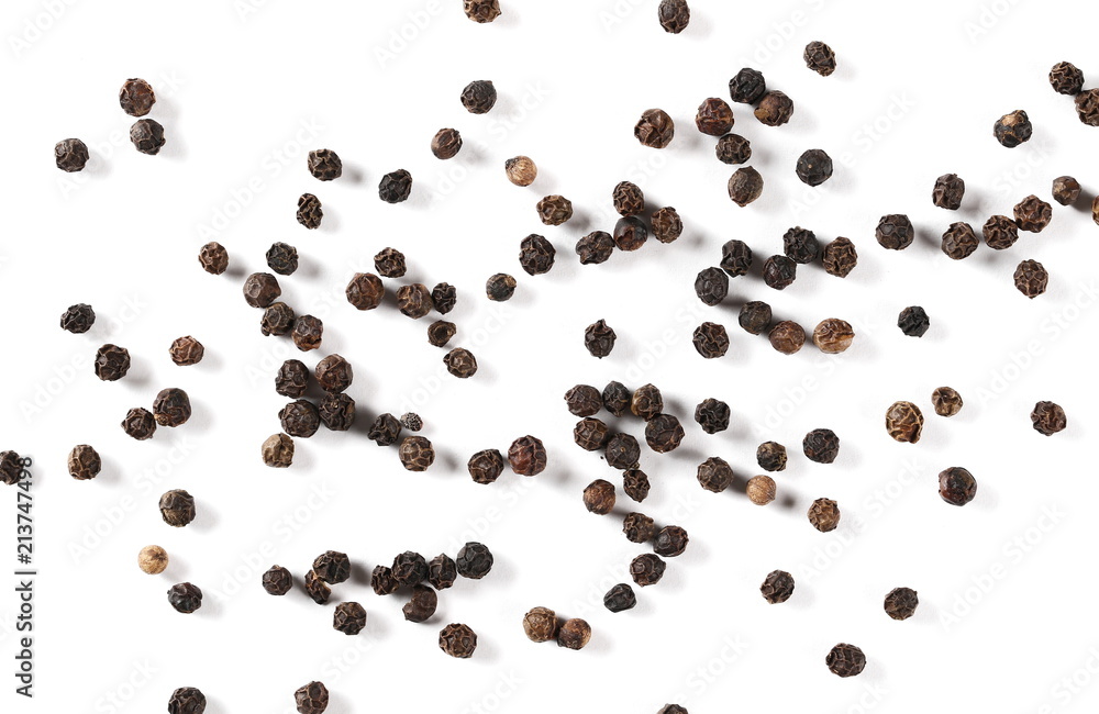 Black pepper pile, peppercorn isolated on white background, top view Black pepper pile, peppercorn isolated on white background, top view