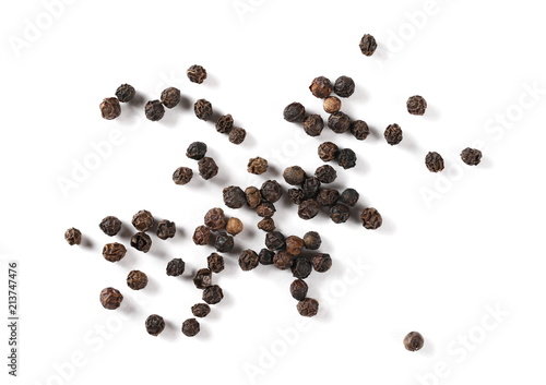 Black pepper pile, peppercorn isolated on white background, top view