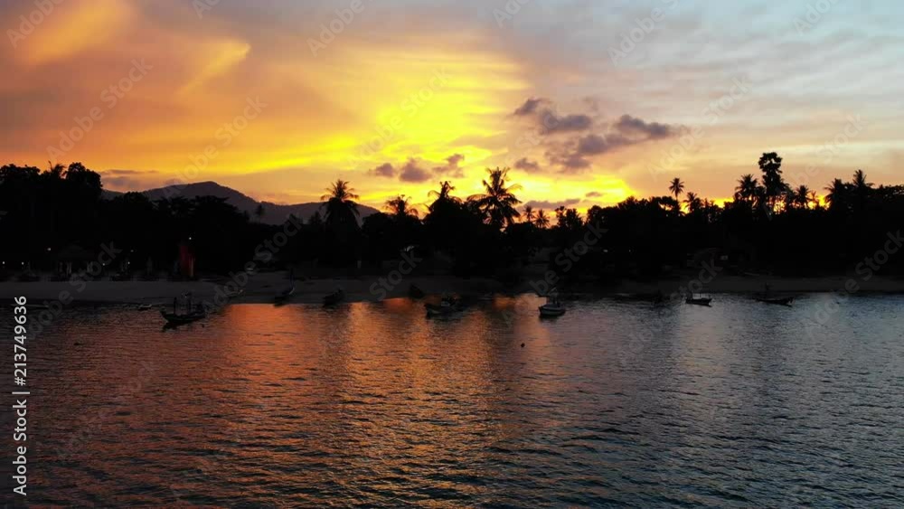 Aerial view tropical beach and sea landscape at sunset time Aerial view tropical beach and sea landscape at sunset time