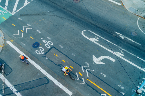 Brooklyn, New York / USA - September 12, 2017: Bikers and walkers from above on a street in Brooklyn