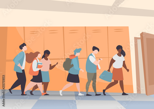 Group of students is on the school corridor to the classroom