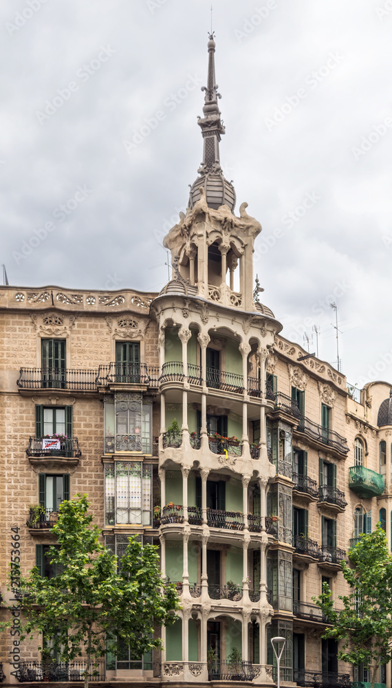 Obraz premium Balconies of casa (house) Josefa Villanueva - one of the most important Modernista legacies. Balconies are built with a structure of graceful columns and crowned by dome surmounted by a slender needle