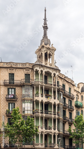 Balconies of casa (house) Josefa Villanueva - one of the most important Modernista legacies. Balconies are built with a structure of graceful columns and crowned by dome surmounted by a slender needle photo