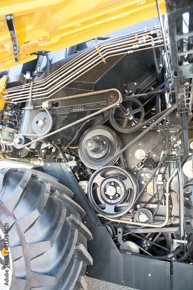 detail of the mechanics of an industrial machine a combine harvester detail of the mechanics of an industrial machine a combine harvester