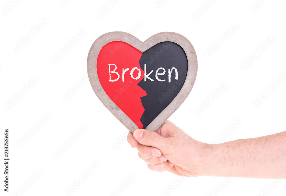 Adult holding heart shaped chalkboard - Broken Adult holding heart shaped chalkboard - Broken