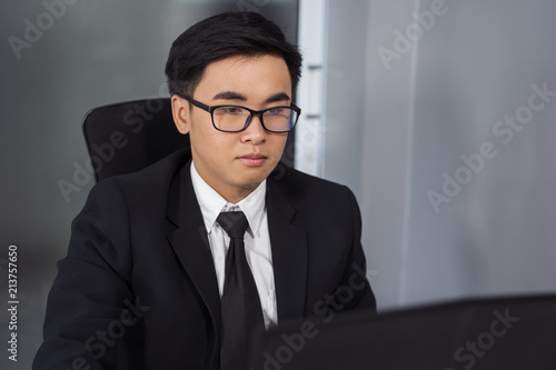 business man using laptop computer