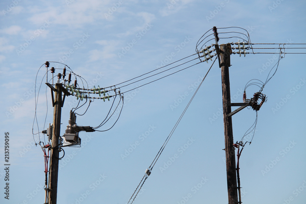 The Poles and Cables on an Electricity Transmission Line. The Poles and Cables on an Electricity Transmission Line.