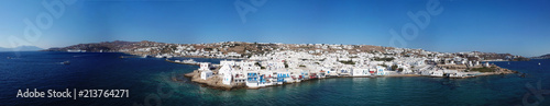 Fototapeta Naklejka Na Ścianę i Meble -  Aerial ultra wide panoramic drone view of iconic chora of Mykonos island featuring picturesque little Venice, Cyclades, Aegean, Greece