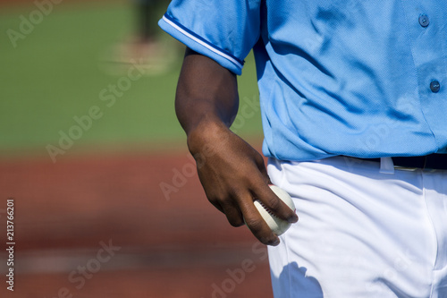 Canvas Print Baseball pitcher holding baseball about to throw the ball