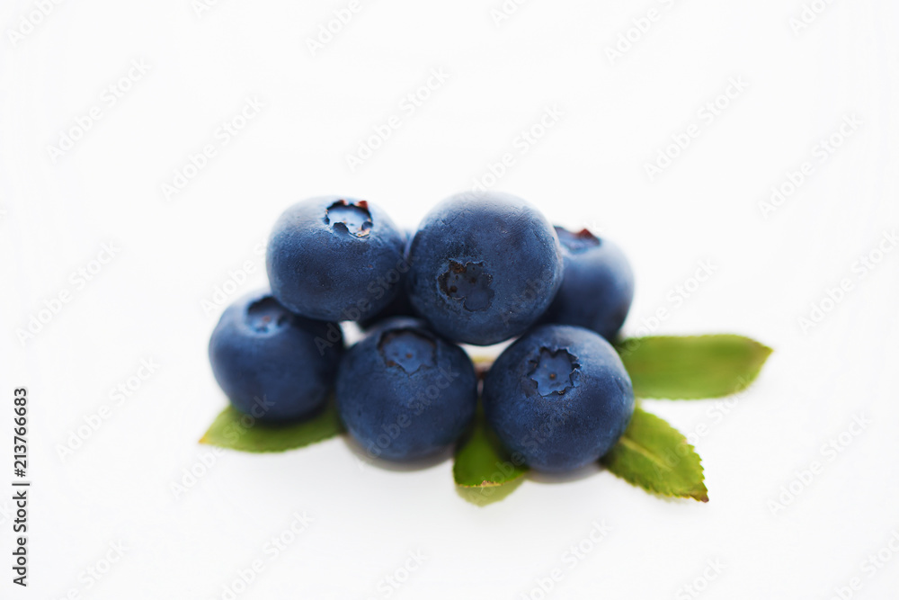 Close-up of ripe fresh blueberries isolated on white background Close-up of ripe fresh blueberries isolated on white background