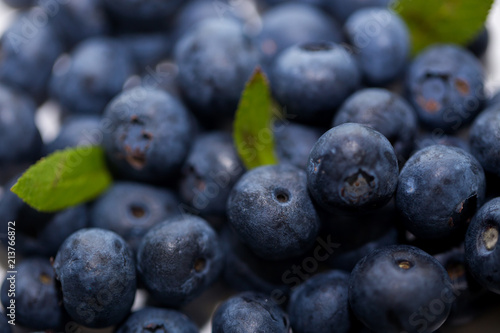 Macro photo of blueberries with selective focus, closeup. Summer vitamins, healthy eyes