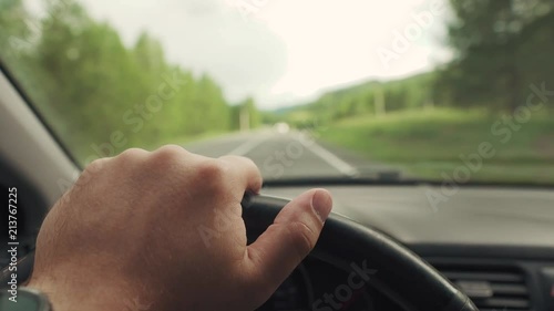 Wallpaper Mural man's hand on the steering wheel Torontodigital.ca