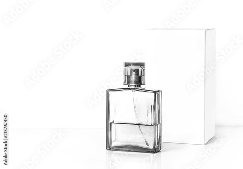 Perfume bottle and white packaging box mockup