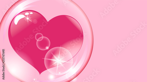 red heart inside a transparent sphere on a pink background soap bubble photo