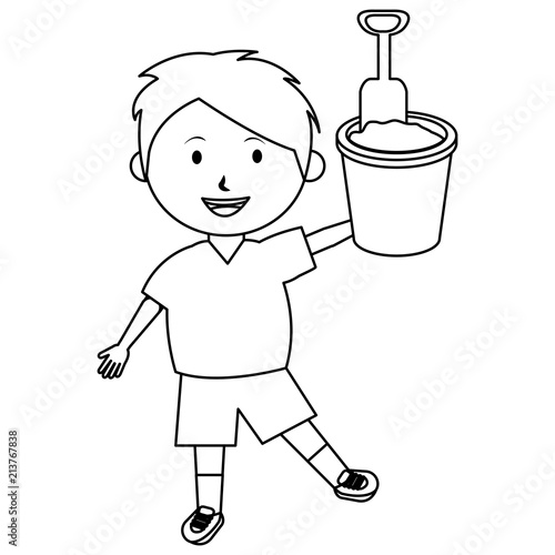 little boy with sand bucket