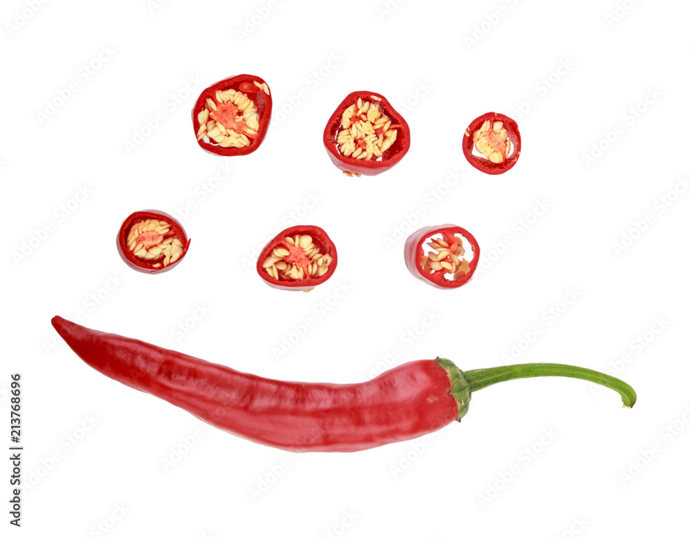 whole and sliced red chilli pepper whole and sliced red chilli pepper