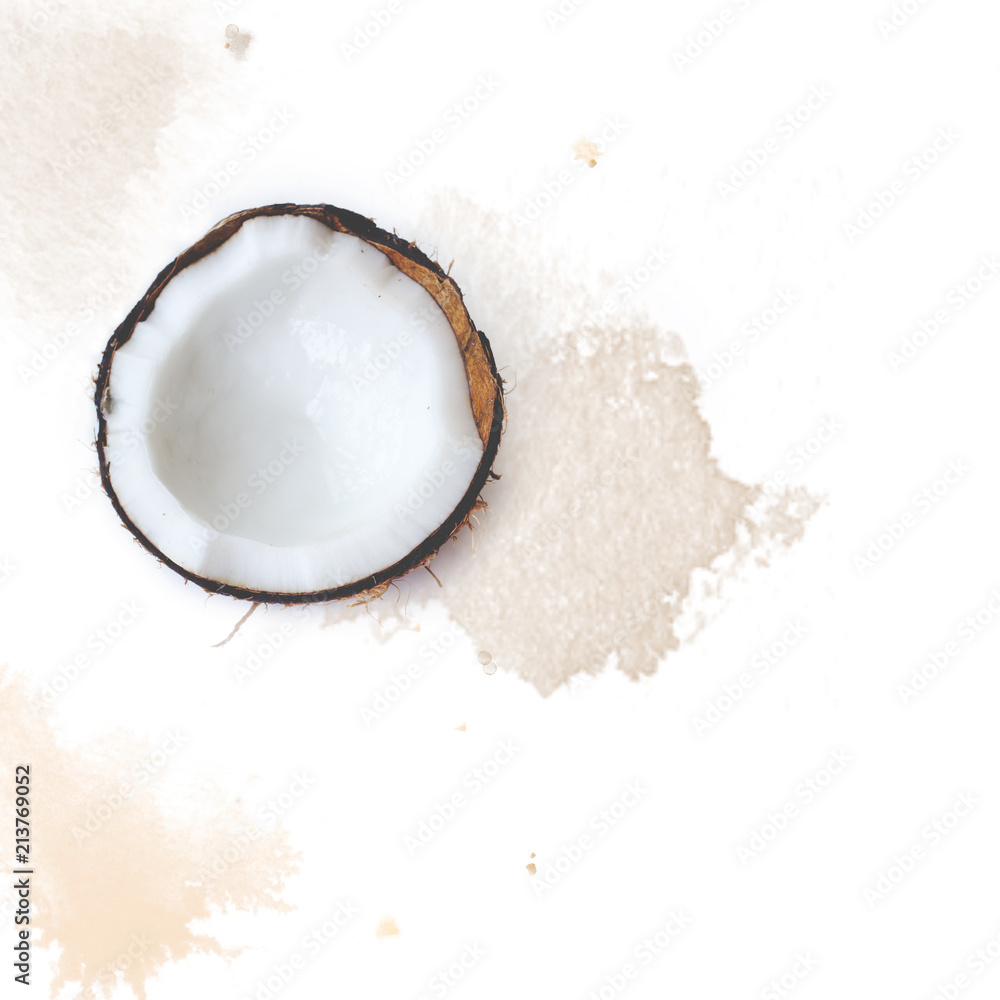 Coconut half on white background with watercolor splashes; Copy space for your text; Fruit background Coconut half on white background with watercolor splashes; Copy space for your text; Fruit background