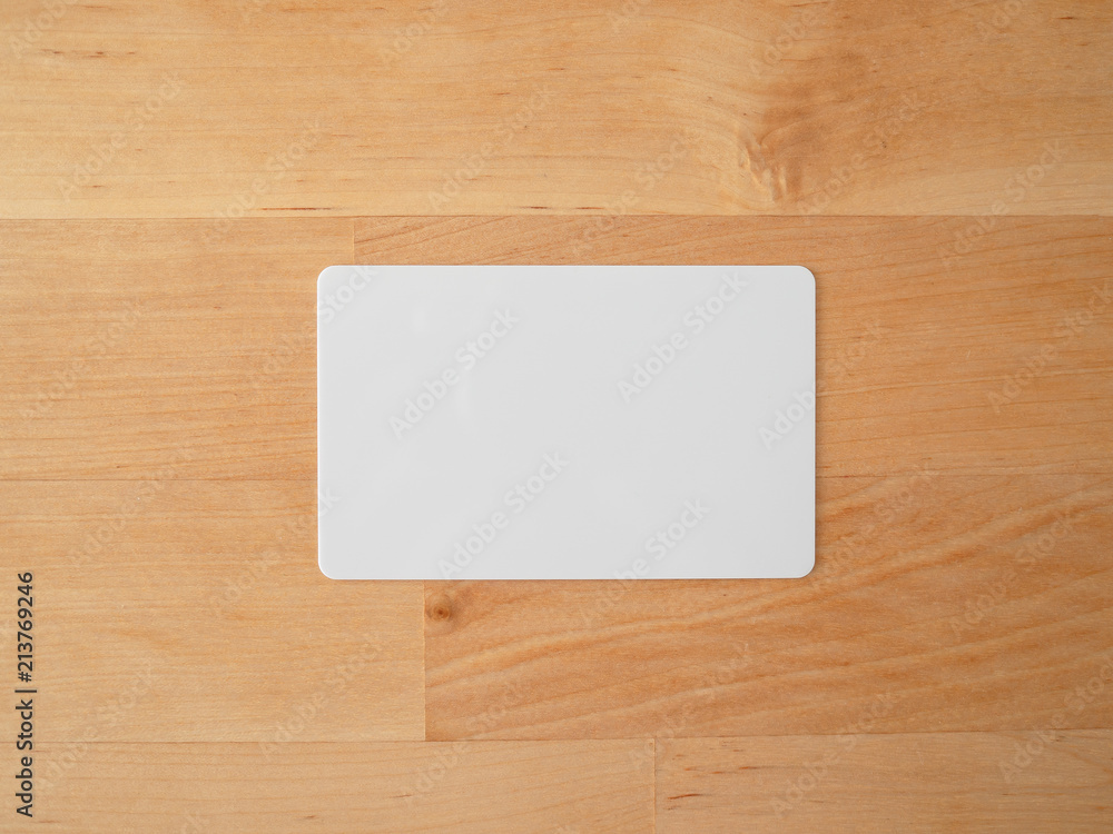 Empty mockup card on wooden table. Empty mockup card on wooden table.
