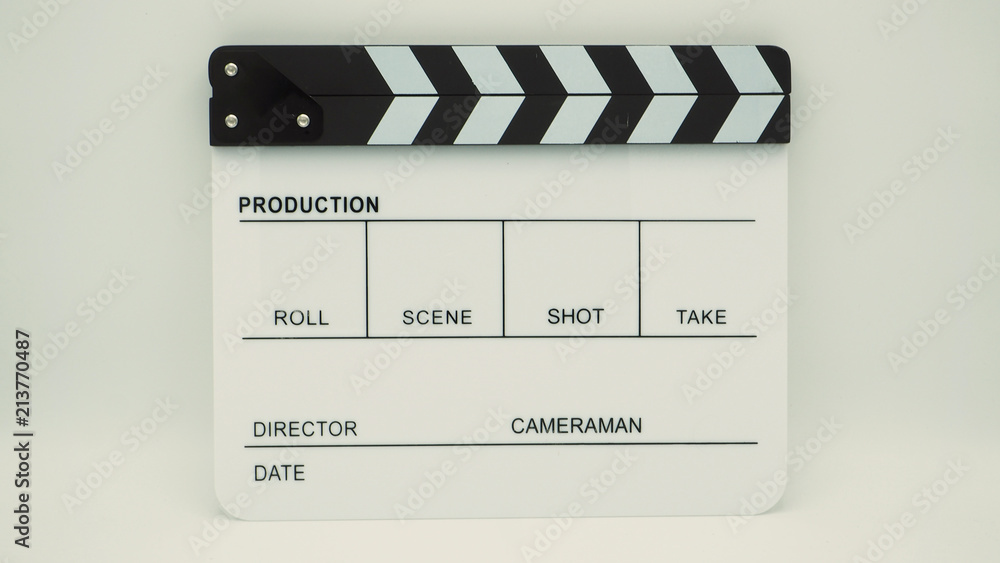  Clapper board or movie slate use in video production or movie and cinema industry. It's white color on white background.