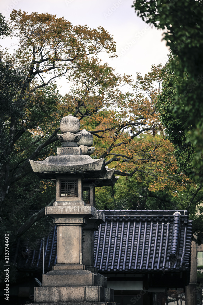Old traditional japanese oriental architecture stone lamp light lantern monolith Old traditional japanese oriental architecture stone lamp light lantern monolith