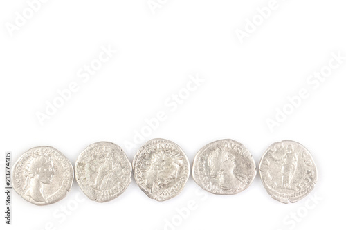 Roman denarius lie on a white background, the era of the Antonines, Marcus Aurelius, Antoninus Pius, Commodus, Caesar photo