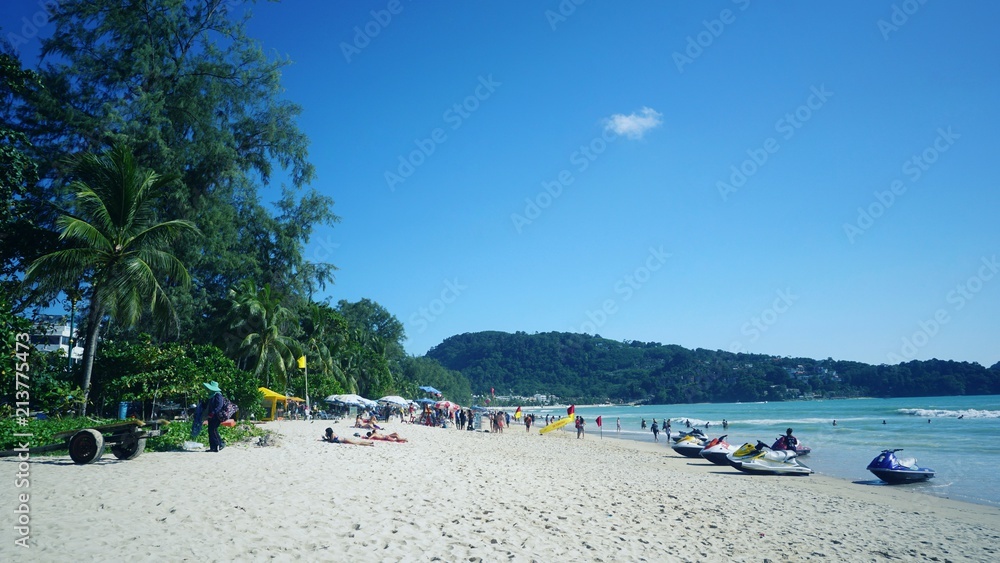 Phuket, Thailand - June 22, 2018 - Peoples relaxing at a beach.