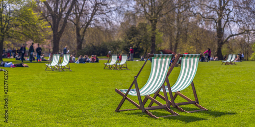 Fototapeta Naklejka Na Ścianę i Meble -  UK, England, London, St. James's Park, Deck chairs