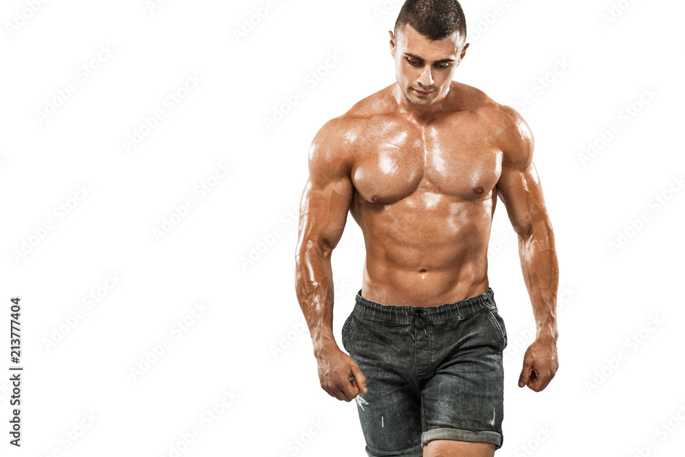 Brutal strong muscular bodybuilder athletic man pumping up muscles on white background. Workout bodybuilding concept. Copy space for sport nutrition ads. Brutal strong muscular bodybuilder athletic man pumping up muscles on white background. Workout bodybuilding concept. Copy space for sport nutrition ads.