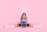 Full length size portrait photo of attractive cheerful cute lovely funny funky fancy lazy leaning on boom box sitting on floor isolated vivid bright background