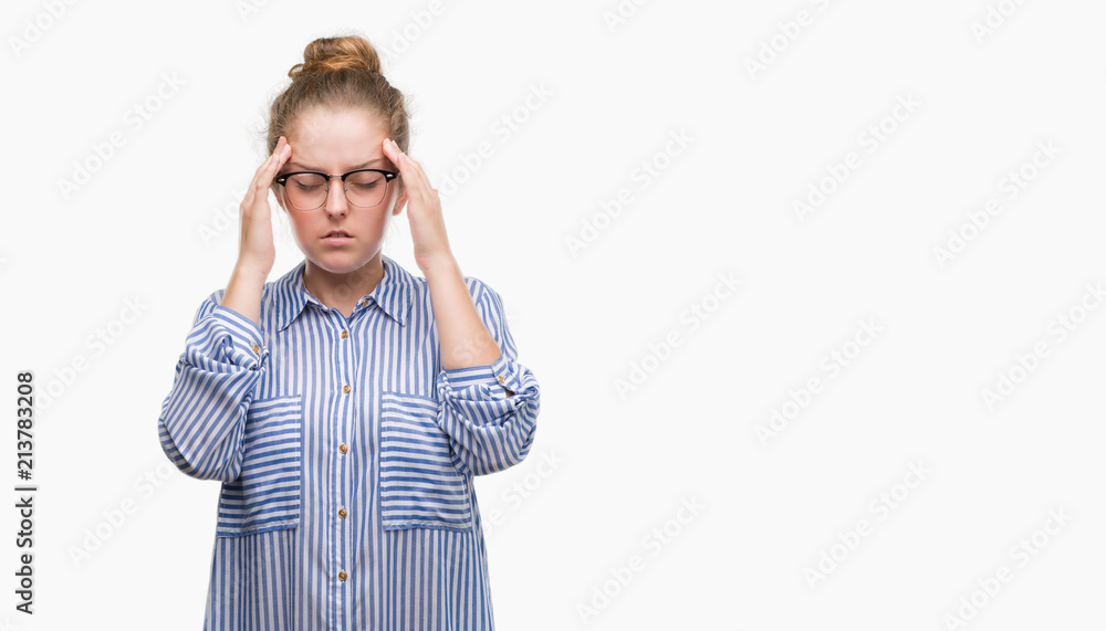 Young blonde business woman with hand on head for pain in head because stress. Suffering migraine. Young blonde business woman with hand on head for pain in head because stress. Suffering migraine.