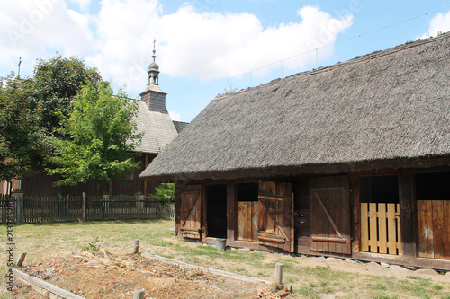 old wooden village - church and stables