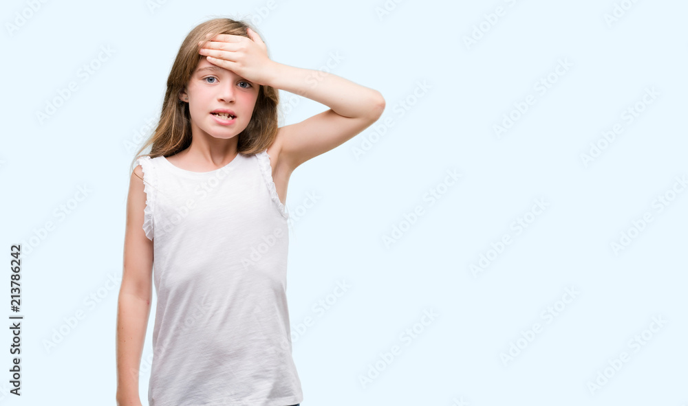 Young blonde toddler stressed with hand on head, shocked with shame and surprise face, angry and frustrated. Fear and upset for mistake. Young blonde toddler stressed with hand on head, shocked with shame and surprise face, angry and frustrated. Fear and upset for mistake.