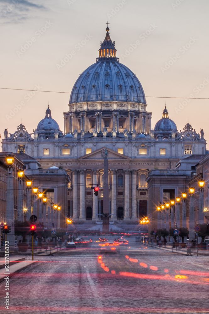 St. Peter's Basilica in the evening with vehicle light trails