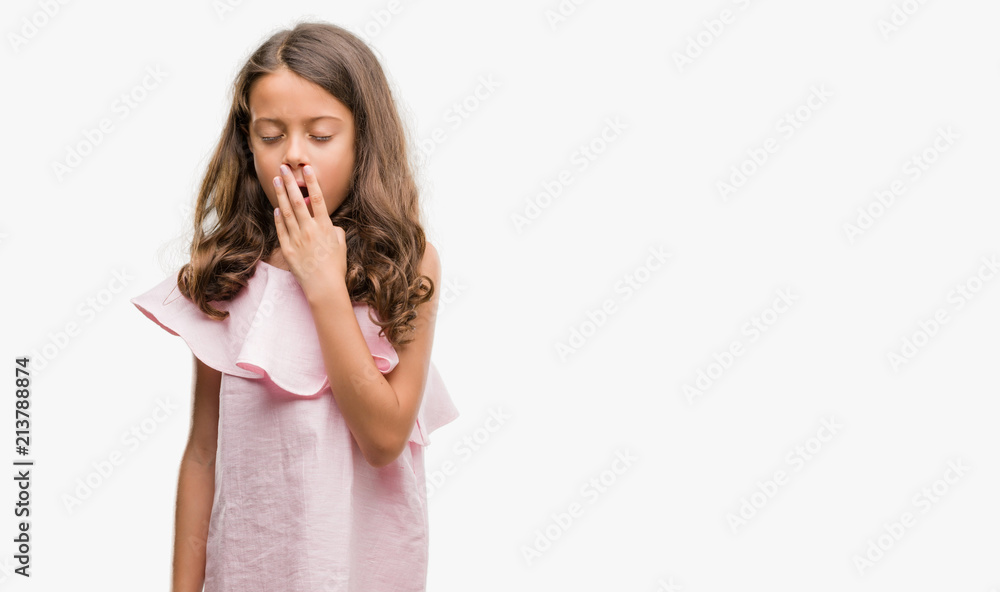 Brunette hispanic girl wearing pink dress bored yawning tired covering mouth with hand. Restless and sleepiness. Brunette hispanic girl wearing pink dress bored yawning tired covering mouth with hand. Restless and sleepiness.