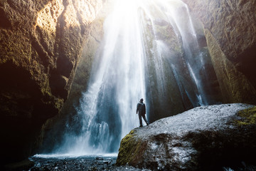 Perfect view of famous powerful Gljufrabui waterfall in sunlight.