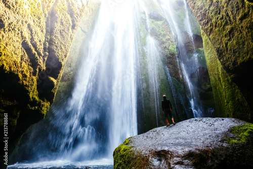 Perfect view of famous powerful Gljufrabui waterfall in sunlight.