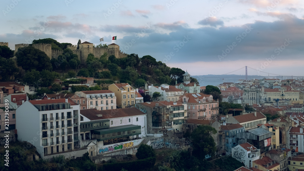 Photograph of Lisbon sunning from a viewpoint in Alfama, Portugal