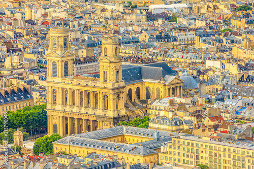 Closeup of Saint-Sulpice Church or Eglise Saint-Sulpice at sunset light from panoramic terrace of Tour Montparnasse. Aerial view of Paris urban skyline, Capital of France in Europe. photo