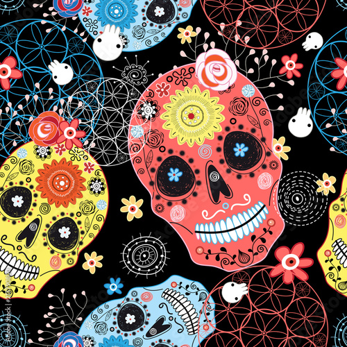Seamless graphic pattern from cheerful ornamental skulls