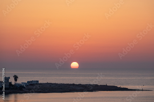 Beatiful sunrise at sea coast © Jarmo V