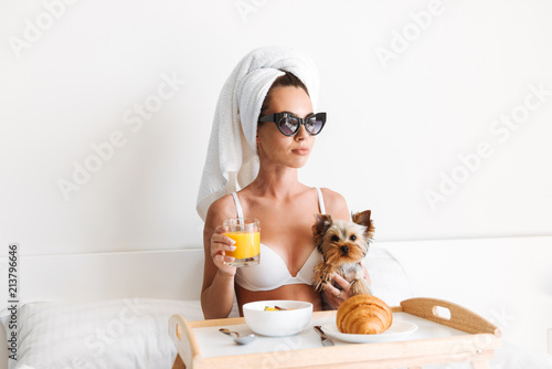Portrait of a celebrity woman in sunglasses photo