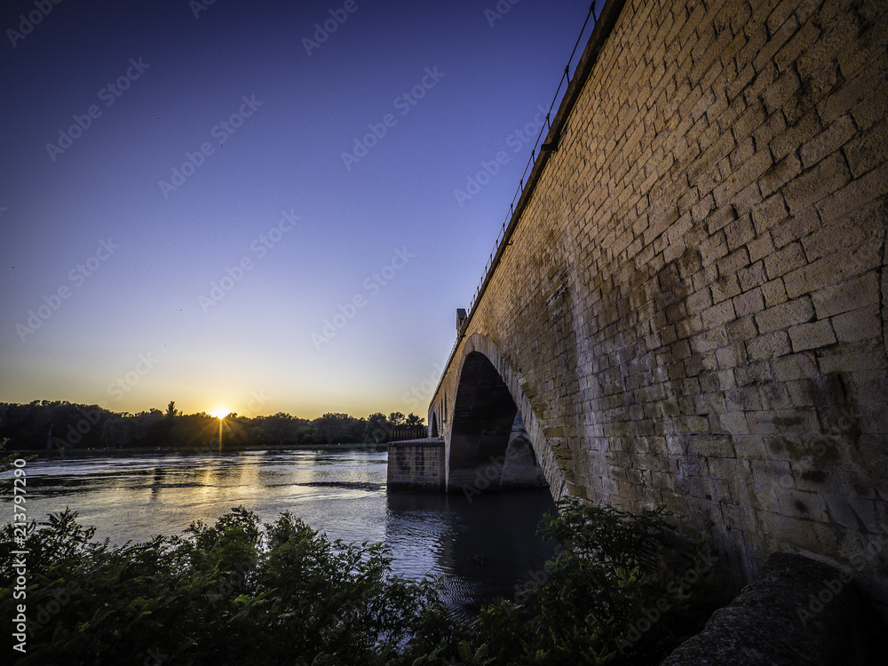 Scenic view of Avignon Bridge Pont d'Avignon during sunset magic hour