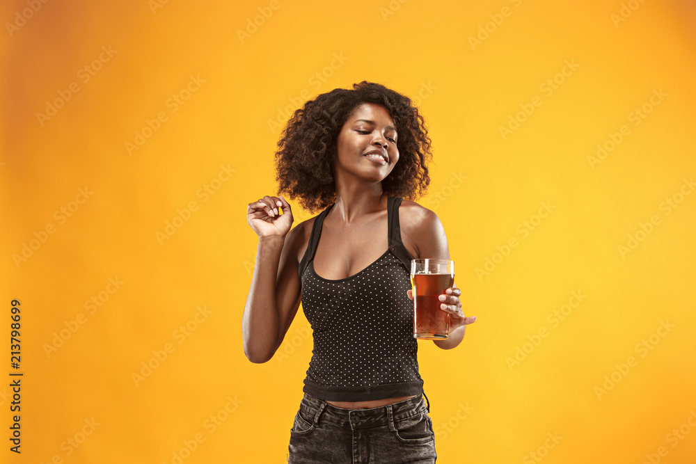 Sexy young afro woman drinking beer, not isolated on white background Sexy young afro woman drinking beer, not isolated on white background