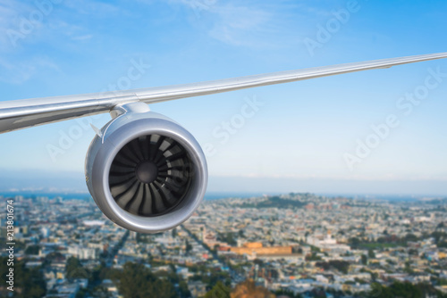 Photography airplane engine above San Francisco city